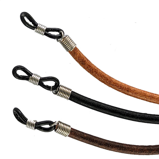 Three leather eyeglass straps in black, brown, and a mix of both on a white background.